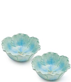 two blue dishes sitting on top of each other