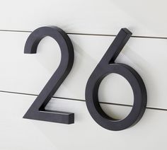 the number twenty two is shown on a white wall