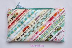 the zippered pouch is made with colorful fabric