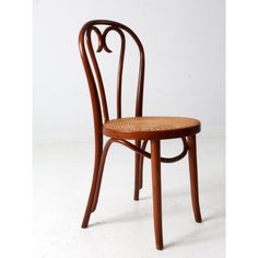 This is a vintage bentwood cafe chair circa 1940s-1960s.  Made in Romania, the classic art nouveau, Thonet style bistro chair has a caned seat. This bentwood chair is a fantastic mix of organic simplicity and artful sophistication. Seagrass Dining Chairs, Cafe Chair, Steel Dining Chairs, Blue Dining Chair, Bentwood Chairs, Made In Romania, Bistro Chairs, Cafe Chairs, Velvet Dining Chairs