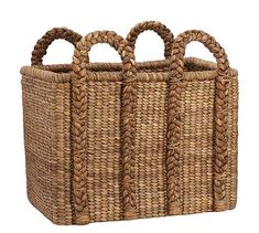 four woven baskets with handles are shown in front of a white background and the bottom is empty