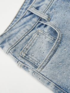 Details: Unique blue-dyed jeans exude a fresh indigo color Sparkling rhinestones, high waist design Relaxed fit with slightly tapered legs Materials & Care: Cottonï¼?9.0% Spandexï¼?.0% 30° Water Wash, Gentle Dry Clean Do not bleach Size & Fit: Model is 5'7", Bust 32, Waist 24, Hips 35, wearing a size S Item #: JM1DP03 Luxury Denim Bottoms, Straight Jeans Chanel Flats, Luxury Designer Blue Jeans, Luxury Fitted Distressed Bottoms, Luxury Designer Fitted Jeans, Luxury Stretch Denim Blue Bottoms, Luxury Acid Wash Cotton Jeans, Luxury Denim Bottoms With Straight Hem, Luxury Medium Wash Jeans With Contrast Stitching