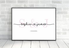 a white framed poster with the word stephanie and james in cursive font on it