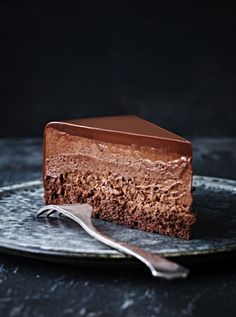 a piece of chocolate mousse cake on a plate