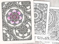 three coloring pages with different designs on them, one is pink and the other is black