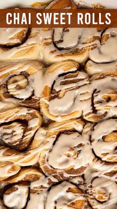 a pan filled with cinnamon rolls covered in icing