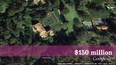 an aerial view of a house in the middle of a wooded area with $ 150 million on it