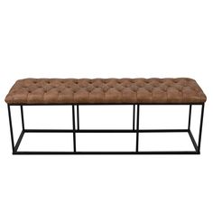 a brown bench with metal frame legs and a buttoned cushion on the top, against a white background