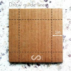 a piece of cardboard sitting on top of a white surface with the words draw guide line