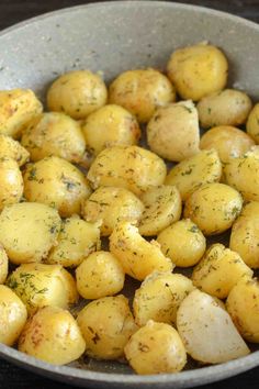 potatoes with herbs in a bowl on a table