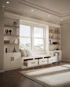 a living room filled with lots of white furniture