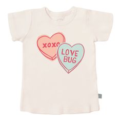 Get your little love bugs ready for Valentine's Day (and super-cute photo opps!). This adorable vintage-inspired tee is perfect for active kiddos, and it's great for layering, too. 100% organic cotton G.O.T.S. certified non-toxic, eco-friendly dyes ethically made in India Also Available in matching Baby Bodysuit Valentines Graphic Tee, Organic Clothes, Toddler Graphic Tee, Mom Graphic Tees, Candy Hearts, Matching Baby, The Perfect Girl, Cat Graphic Tee