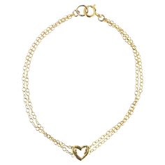 This little heart is so perfect to add to your bracelet stack. A simple 18k gold heart with a chain looped through making a double chain bracelet. It's too cute. -18k solid gold pendent -18k gold chain -heart measures 5.2x5mm -6.5" chain length Gold Pendent, Double Chain Bracelet, Gold Heart Bracelet, Chain Heart, 18k Gold Chain, Chain Loop, Double Chain, Gold Heart, Heart Bracelet