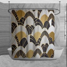 the shower curtain is decorated with gold and black art deco fan design on it's side