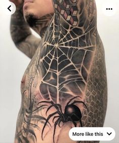 a man with a spider tattoo on his chest