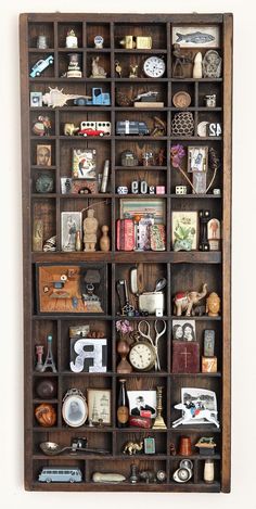 a wooden shelf filled with lots of assorted items