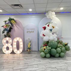 balloons are arranged in the shape of letters and flowers