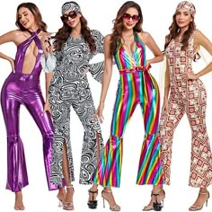 four women in colorful jumpsuits standing next to each other with their hands on their hips