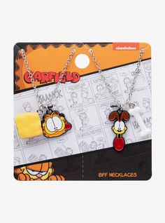 two key chains with cartoon characters on them