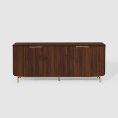 the sideboard is made from wood and has two brass handles on each side, along with