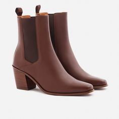 A unique Chelsea boot. Inspired by cowboy boots and western styling, the Bianca Chelsea Boots kick things up a few notches. The semi square toe box, alluring Cuban heel and sculptural shape create a captivating silhouette that will attract the right kind of attention. With a contemporary look and feel, the Biancas love to have fun, and play well with your casual outfits and dressy ensembles. Go ahead, take them for a whirl. This product is made from Gold Rated full-grain calfskin leather sourced Oxford Boots, Cuban Heels, Chelsea Boots Women, Black Boots Women, Chelsea Boot, Sneaker Shopping, Boot Shop, Shoe Shop, Cowboy Boots