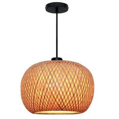 an orange light hanging from a ceiling fixture with a circular pattern on the top and bottom