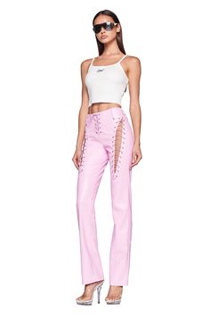 Details Best-selling Xenia Pant is back! Pink faux leather pant Mid to high rise fit Full length pant Bodycon fit to the knee that flares out at leg opening Belt loops around waist Button fly closure with true lace up ties Featuring lace-up detail at the front of the pant on the upper thigh of both legs and at the centre front Cut outs and adjustable lace up on thighs Lace up centre front closure Unlined - This fabric is not sheer Recommended Underwear: Due to the lace up detail around the thigh Pink Lace Up Pants, Pink Leather Outfit, Qveen Herby, Lace Up Jeans, Lace Up Pants, Concert Fit, Nashville Outfits, Leather Pant, Concert Fits