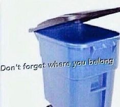 a blue trash can with a metal lid and an inscription that reads, don't forget where you belong