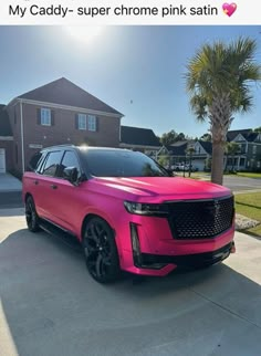 a pink suv parked in front of a house with the caption my caddy - super chrome pink satin