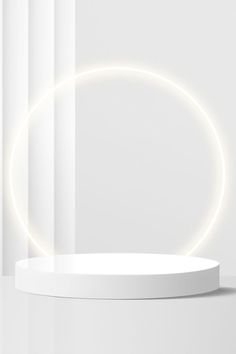 an empty white podium with a circular light in the middle and curtains behind it, on a plain surface