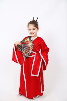 Kimono children's dresses are stylish and comfortable dresses inspired by Japanese culture. Suitable for both girls and boys, these dresses stand out with their wide cuts and comfortable fabrics that allow children to move. Kimono children's dresses keep children cool with their light and thin fabrics, which are preferred especially in summer. In addition, they can be used in accordance with different styles thanks to various pattern and color options. If you want to add a different touch to you School Event Dress, Dress School, Japanese Kids, Children's Dresses, Handmade Costumes, Asian Countries, Event Dress, School Event, Japanese Dress