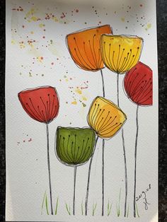 some flowers are painted on white paper and have red, yellow, green and orange petals