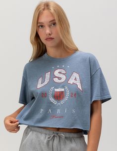 Rsq Usa Crop Tee. Large Graphic Screened On Front. Ribbed Crew Neckline. Short Sleeve. Boxy And Cropped Fit. 100% Cotton. Machine Wash. Imported. Model Is Wearing A Size Small. Model Measurements:height: 5'8" Bust: 32"waist: 25"hips: 35" Wwe T Shirts, Skater Outfits, Flannel Sweatshirt, Graphic Trends, Boys Graphic Tee, Girls Graphic Tee, Girls Blouse, Top Graphic Tees, Sweaters And Jeans