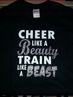 a black shirt that says cheer like a beauty train like a beast