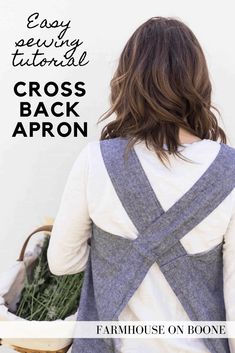 the back of a woman wearing a cross back apron with text overlay that reads, easy sewing technique cross back apron