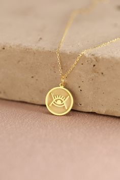 Gold Adinkra Pendant - Universe Adinkra Gold Necklace ● Material of pendant: Solid Gold 14k ( REAL GOLD ) ● Metal Stamp: 14k ( REAL GOLD ) ● The pendant is available in 5 sizes: - 12,7 mm / 0.5 inches (Diameter) - 14,0 mm / 0,55 inches ( Diameter ) In the photos - 15,3 mm / 0.6 inches ( Diameter ) - 16,5 mm / 0,65 inches ( Diameter ) - 19,1 mm / 0,75 inches ( Diameter ) ( In the photos the size is 14mm / 0.55 inches Diameter ) ( Jump Ring inner diameter: 4 mm ) ● Material of chain: Solid gold 14 Gold Boxing Gloves, Hourglass Pendant, Space Lovers Gifts, Camera Necklace, Saturn Necklace, Raven Pendant, Octopus Necklace, Islamic Jewelry, Eagle Necklace