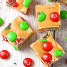 several pieces of cake with candy on top