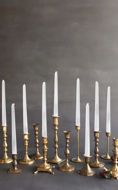 a group of candles sitting next to each other