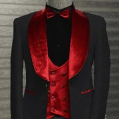 a tuxedo jacket with a red bow tie