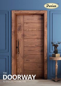 the door way magazine cover with an image of a deer statue and blue painted walls