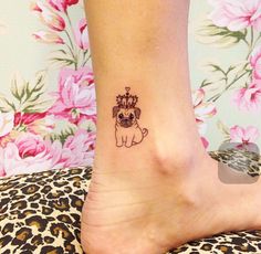 a small pug tattoo on the ankle