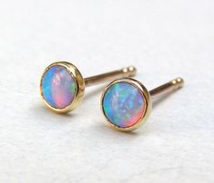 Tiny Blue Opal Stones Studs in Recycled 14k solid yellow Gold : You are looking at a beautiful HAND MADE 14k gold earrings. Coming with silicone nuts. READY TO SHIP These studs look gorgeous - and so unique! Stone size: 4mm Tiny Gold Studs, Blue Opal Earrings, Earrings Opal, Opal Earrings Stud, Solid Gold Earrings, Opal Studs, Tiny Stud Earrings, Small Earrings Studs, Studs Earrings