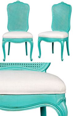 three chairs and a bench made out of blue caned wood with white upholstered cushions