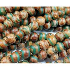 6mm Antiqued Wavy Green Line Brown Agate Beads for Jewelry Making 15.5 inch strand, approximately 64 beads. These Antiqued Dzi finished Tibetan Dzi style agate beads are high quality agate with handcrafted designs. The beads are matte finished. The color is dark brown with green wavy lines. The stones are natural genuine agate. Free Shipping for United States orders of $35 or more. Copy and paste the link below to your browser to view all of our products. Or type GiftsJoy in the search box to see them. https://www.walmart.com/search?q=GiftsJoy Beads usually come in a strand of 13 to 16 inches in length. Bead holes : 0.8mm - 1mm Beads per strand: 4mm 90 beads 6mm 60 beads 8mm 46 beads 10mm 37 beads 12mm 32 beads 14mm 27 beads 16mm 22 beads This product is useful for * Jewelry designers * Cr Jewelry Making Pearls, Pearl Crafts, Brown Agate, Tibetan Jewelry, Indian Agate, Bead Sewing, Natural Jewelry, Wavy Lines, Fire Agate