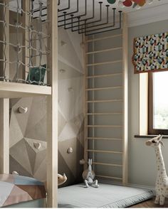 a child's bedroom decorated in neutral colors and shapes with a giraffe toy next to the window