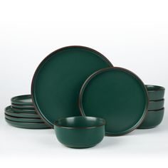 green dinnerware set with brown rims