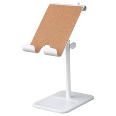 a white stand with a cork board attached to it