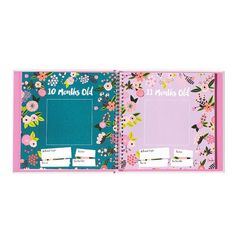 a pink and blue binder with flowers on it