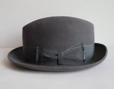 "Size 54,5 cm - 21,45\" The hat has a mark in the back on top and small signs of wear Priced accordingly Very good vintage condition 7" Vintage Fedora With Flat Crown, Classic Adjustable Hats For Derby, Classic Adjustable Hat For Derby, Classic Adjustable Derby Hat, Formal Adjustable Top Hat With Flat Bill, Retro Hat With Adjustable Flat Crown, Adjustable Curved Brim Hat For Derby, Adjustable Brimmed Hat For Derby, Retro Adjustable Felt Hat With Flat Brim