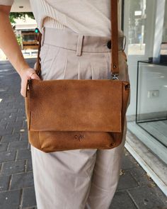 This small leather crossbody bag as elegant and cool design.  It has clean lines and it is made from beautiful high quality leather in Honey Brown color that will last forever With a YKK Zipper closure and a flap over closure, it has a removable adjustable shoulder strap.  ♦ ♦ ♦ The perfect way to add chic and sophistication to your wardrobe. This Leather shoulder bag is a simple yet functional everyday bag that adds a pop of coolness to any outfit. Features►   * Handmade leather bag * YKK metal Elegant Leather-lined Crossbody Shoulder Bag, Casual Leather Shoulder Bag With Anti-theft Pocket, Brown Suede-lined Crossbody Shoulder Bag, Brown Leather-handled Crossbody Box Bag, Brown Shoulder Bag With Anti-theft Pocket For Everyday Carry, Leather Handbags Handmade, Ladies Purse, Purse Gift, Honey Brown